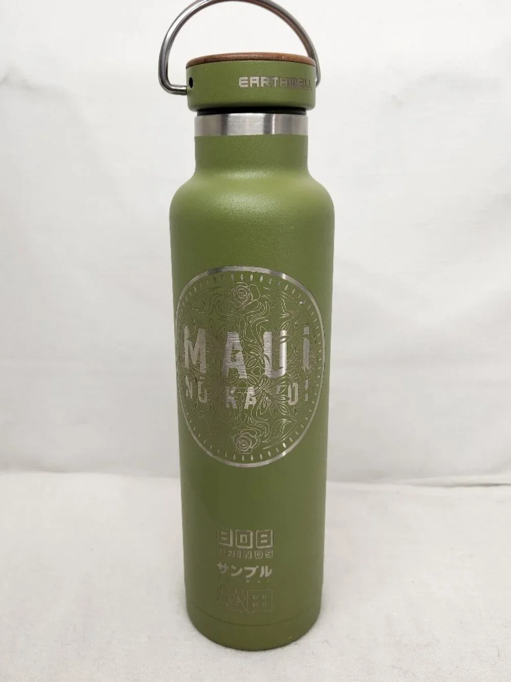 Earthwell Woodie Maui No Ka Oi 808 Grinds  22oz Woodie vacuum insulated bottle